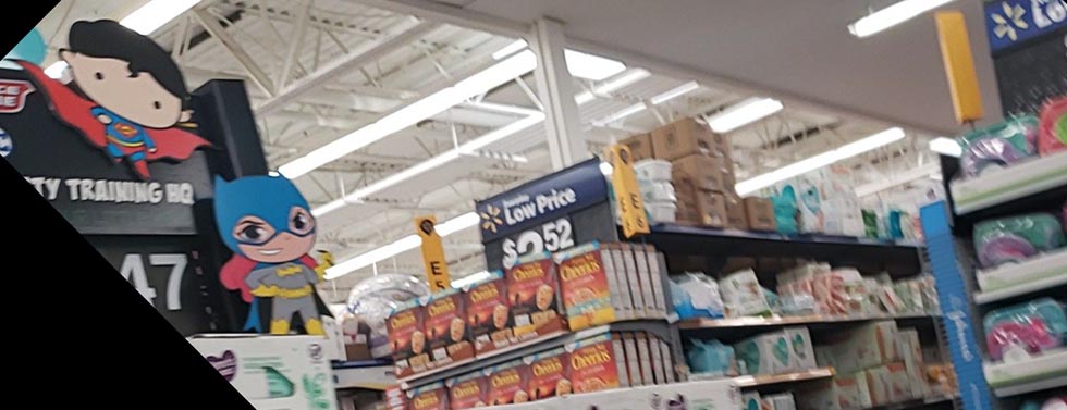 Superman and Batgirl at Walmart